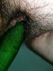 Smiling female puts on hot bra