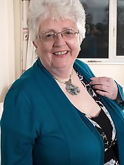 Naughty big breasted british granny getting frisky