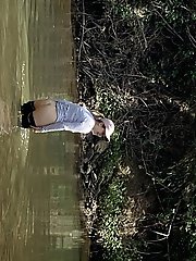 Young mature womans buttocks outdoors