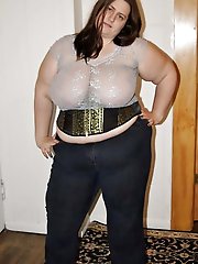 Lascivious mature businesswomen in a sex gallery