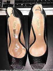 A stunning mature woman is half naked and posing for money.