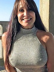 Posh mature granny is fingering her wet twat